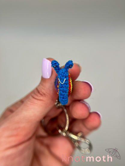 scout snail keychain