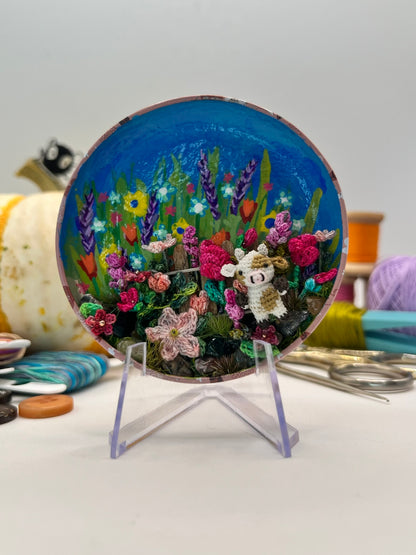 camilla cow · flower garden scene with stand